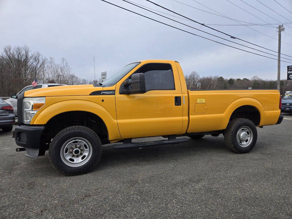 DMV Haul Away yellow Ford truck